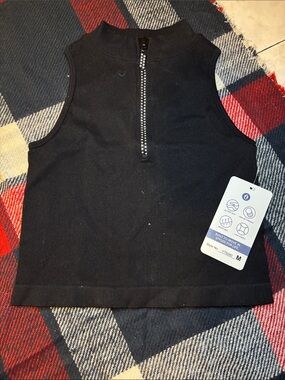 Black Sleeveless Ribbed Bodysuit with Front Zip